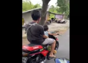 Viral Balita Mengendarai Motor, Denda hingga Penjara Menanti